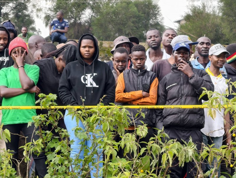 Members of the public at Makaburini in Kericho where a mass grave was discovered.